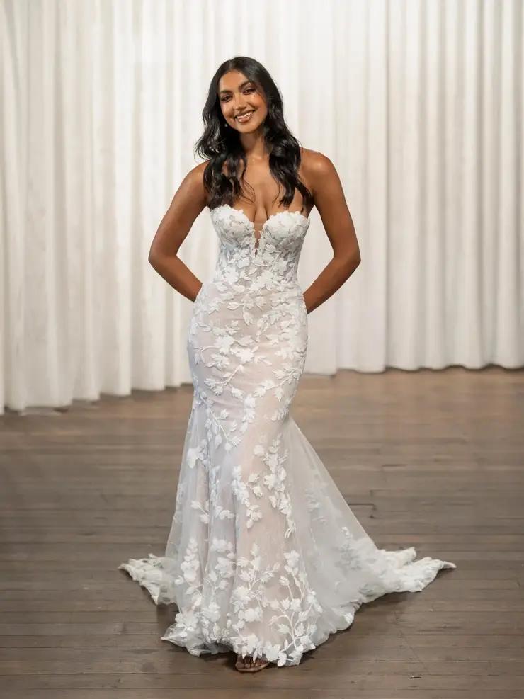 Model wearing white wedding gown