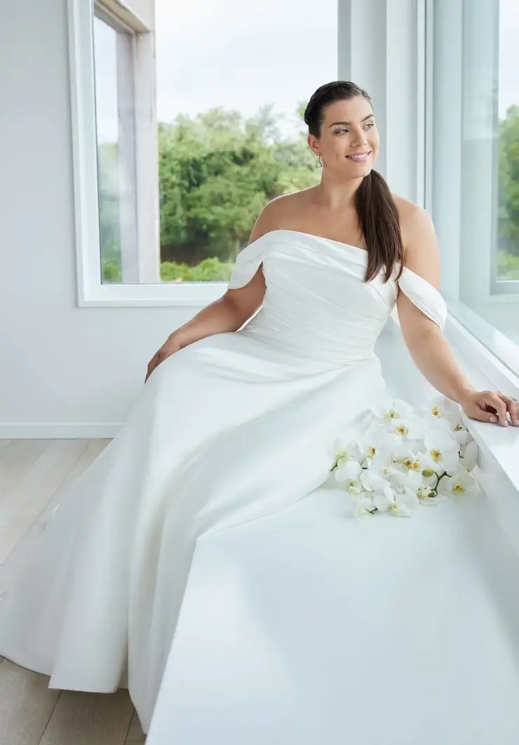 Model wearing Morilee wedding dress